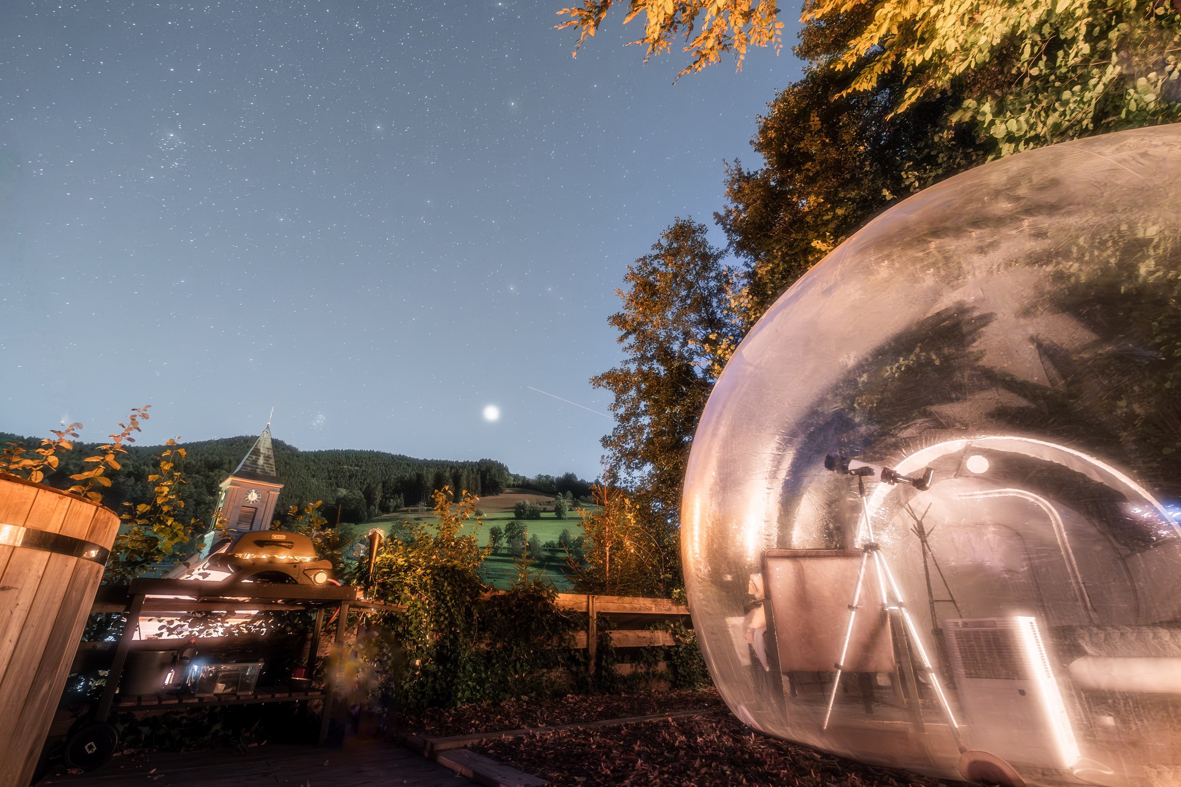 Bubble Tent under a starry sky, looking over the landscape near Elzach